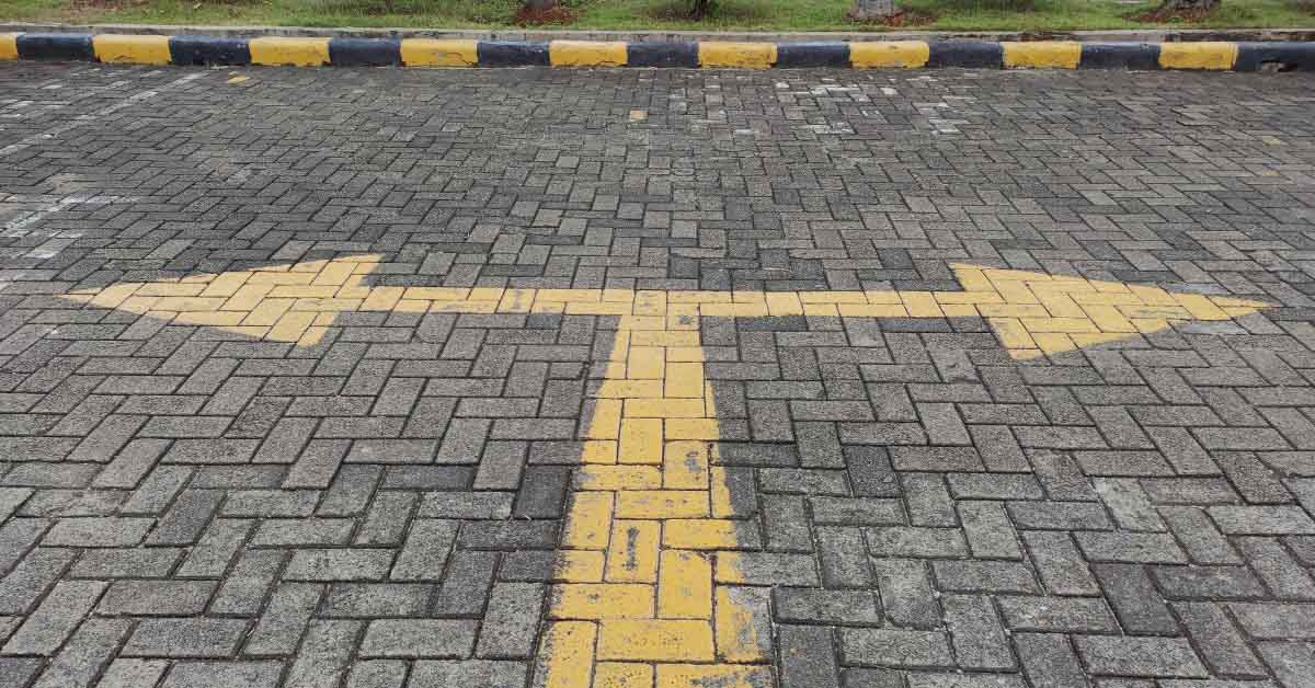 image of directional arrows on a street