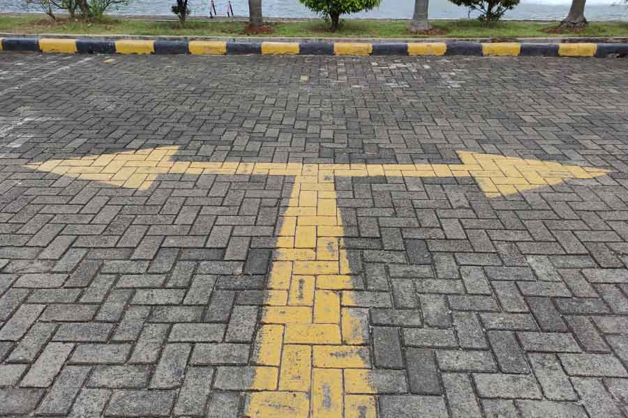 image of directional arrows on a street