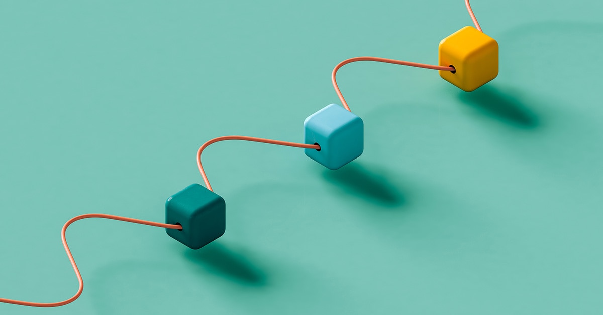 Three colorful interlocked cubes