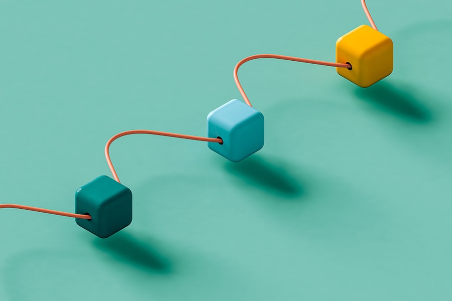 Three colorful interlocked cubes