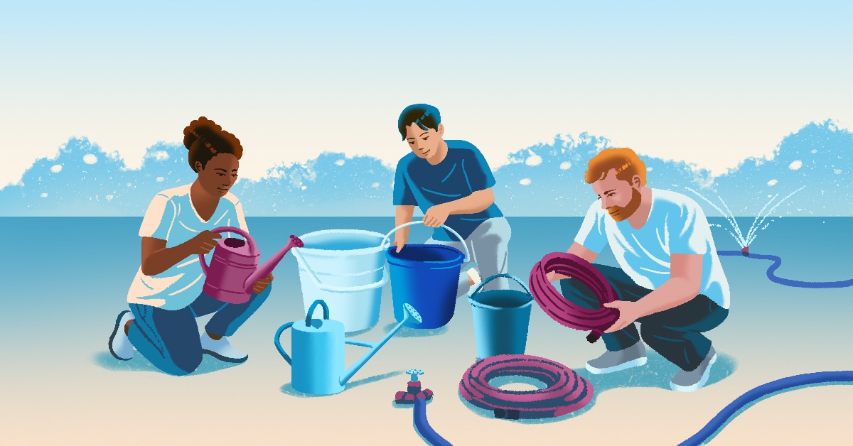 People measuring water in watering cans for a garden.