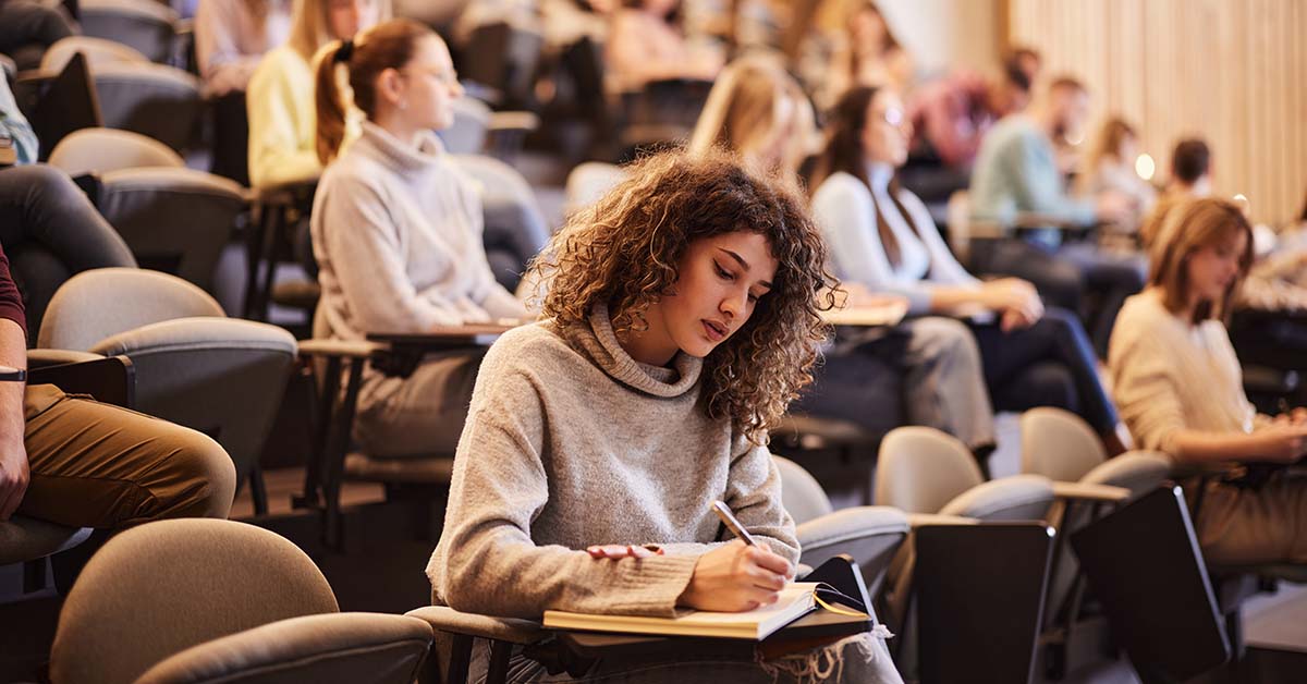 Photo of college student in a classroom