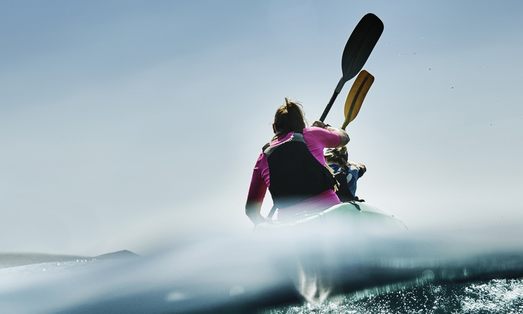two people kayaking