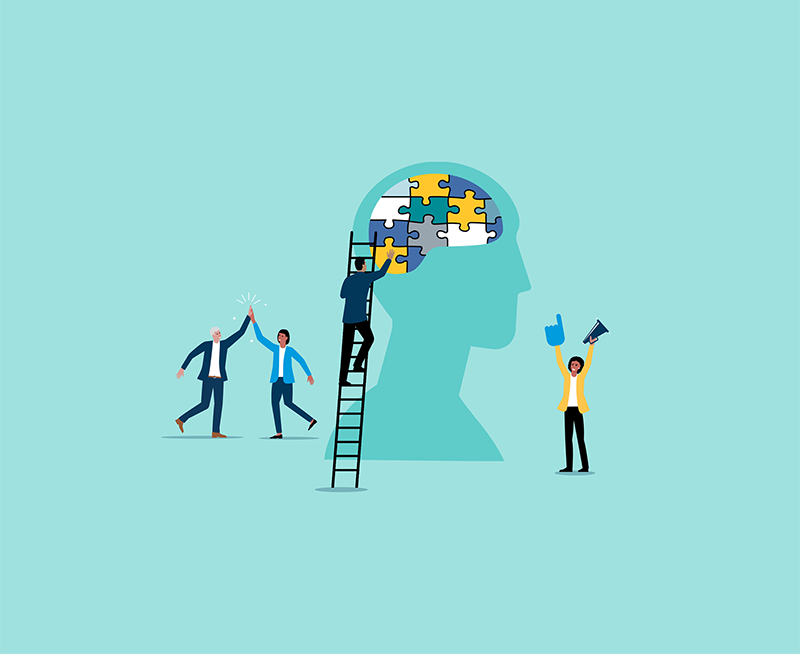 A flat illustration of a team of people completing a puzzle in the shape of a brain