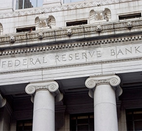 Higher Ground: Fed Keeps Rates Unchanged but Upgrades Outlook