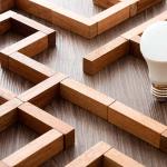 puzzle maze with light bulb within