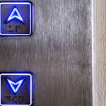 Image of up and down elevator call buttons