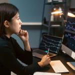woman looking at a computer