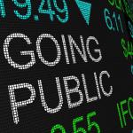 marquee sign showing "Going Public"