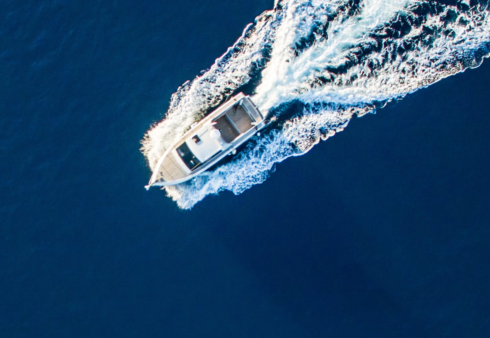 A boat navigating through ocean waters